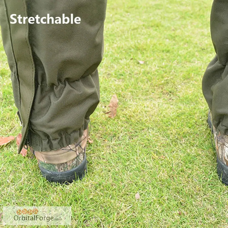 Stretchable olive-green pants with elastic ankle cuffs worn over hiking boots.