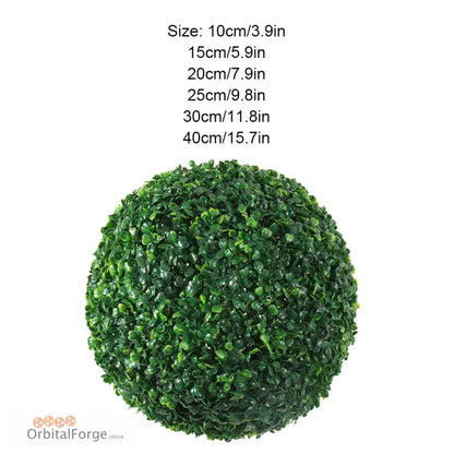 Artificial topiary ball made of green synthetic leaves.