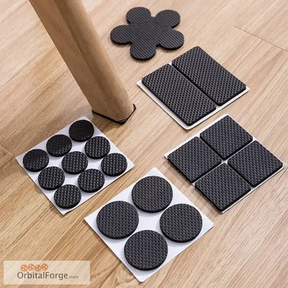 Assorted black furniture pads.