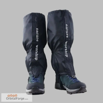 Black waterproof gaiters with Velcro & zip worn over hiking boots for outdoor activities