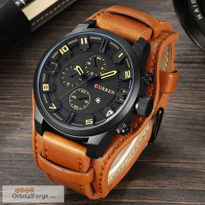 Stylish black chronograph watch with a tan leather strap.