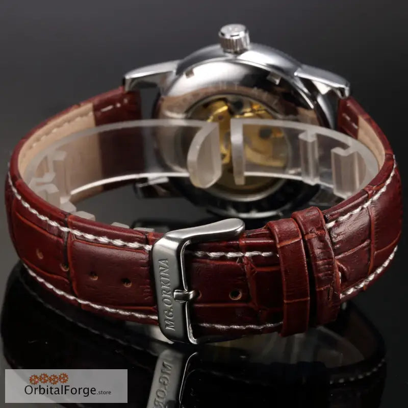 Luxury wristwatch with brown leather strap and 40mm polished case design