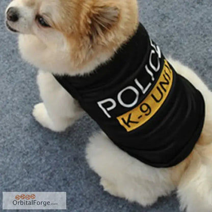 Cream-colored dog wearing a black ’POLICE K-9 UNIT’ vest.