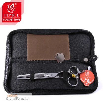 Professional hair cutting scissors in a black leather case with a brown accent patch.