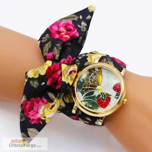 Floral fabric bracelet watch featuring butterfly face design and bow-style band