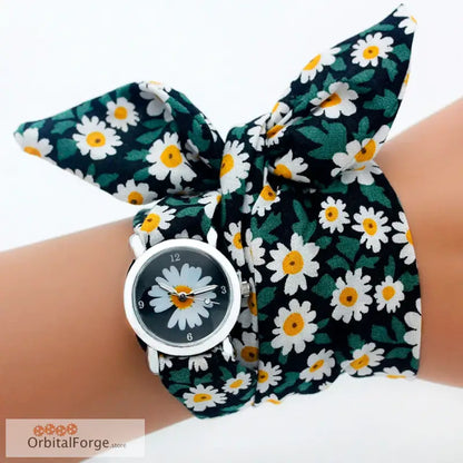 Floral fabric bracelet watch featuring a daisy pattern bow band and matching face