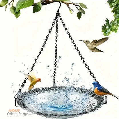 A hanging glass birdbath with chain suspension and decorative birds perched on its edges.