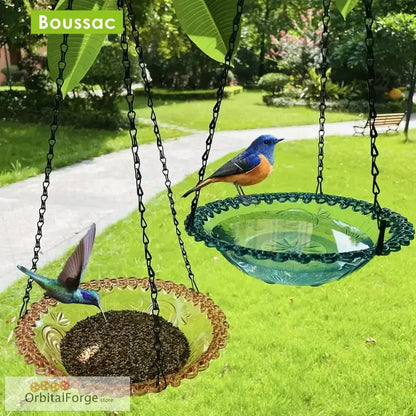 Hanging bird feeder made from decorative glass plates suspended by chains.