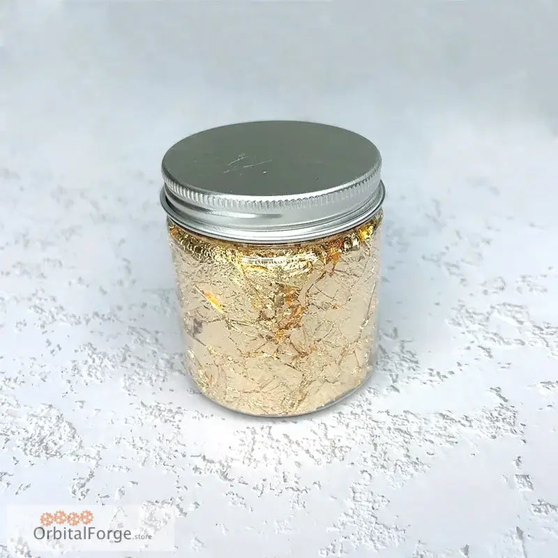 Jar filled with gold leaf flakes.