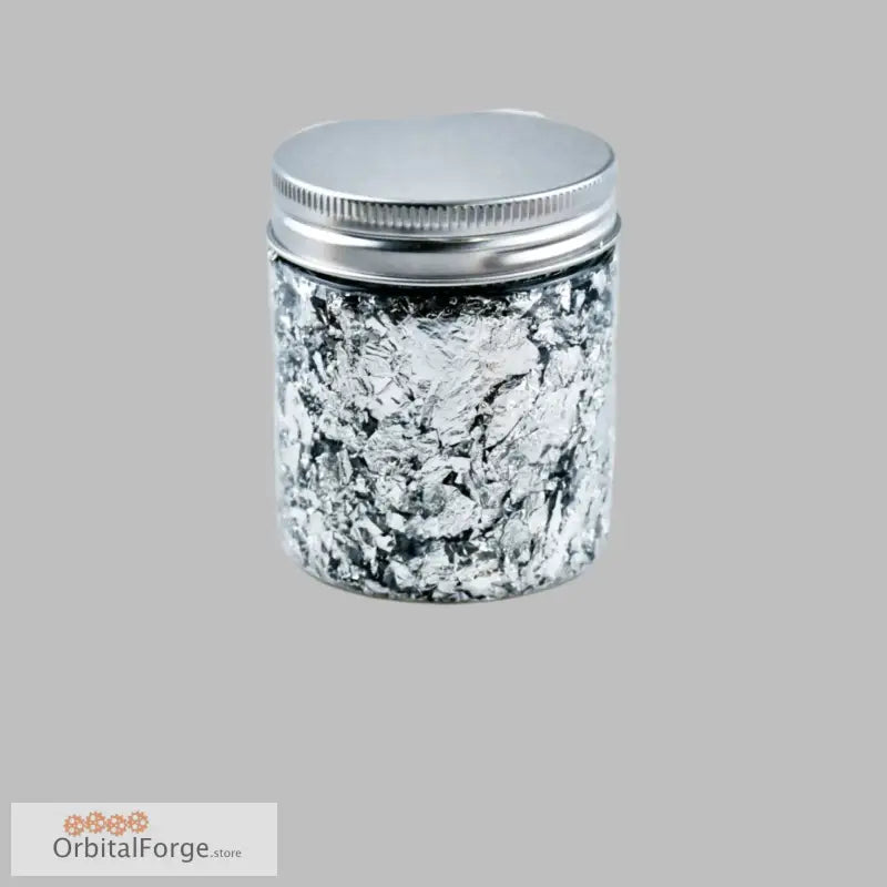 Jar of silver leaf flakes.