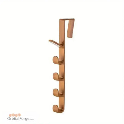 Copper-colored over-the-door hook rack.