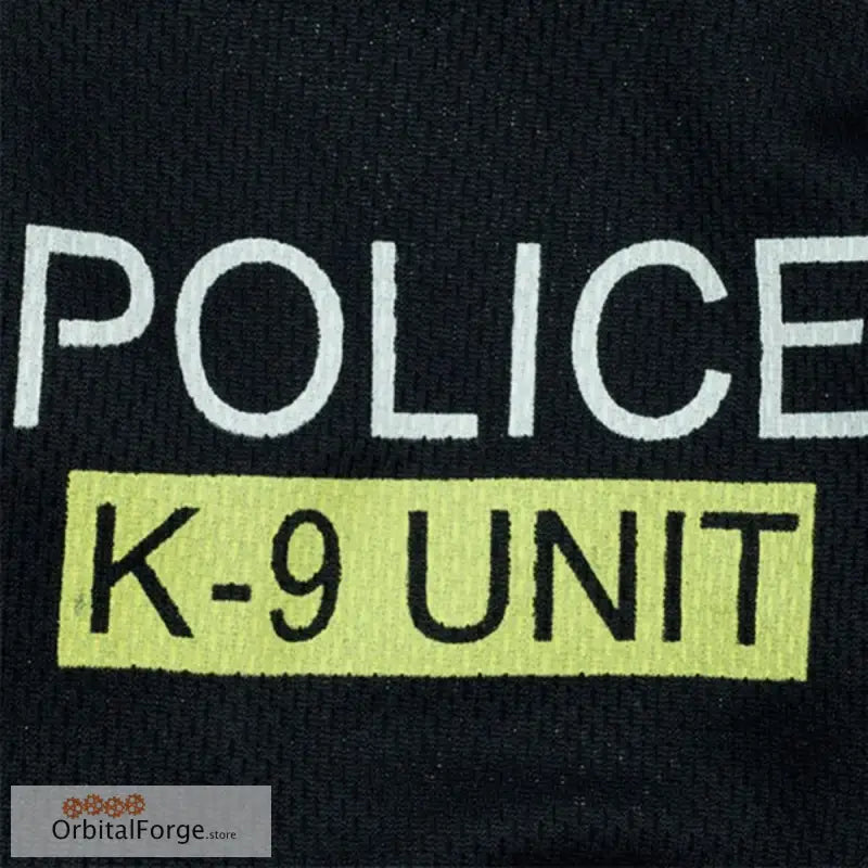 White and yellow text reading ’POLICE K-9 UNIT’ on black fabric.