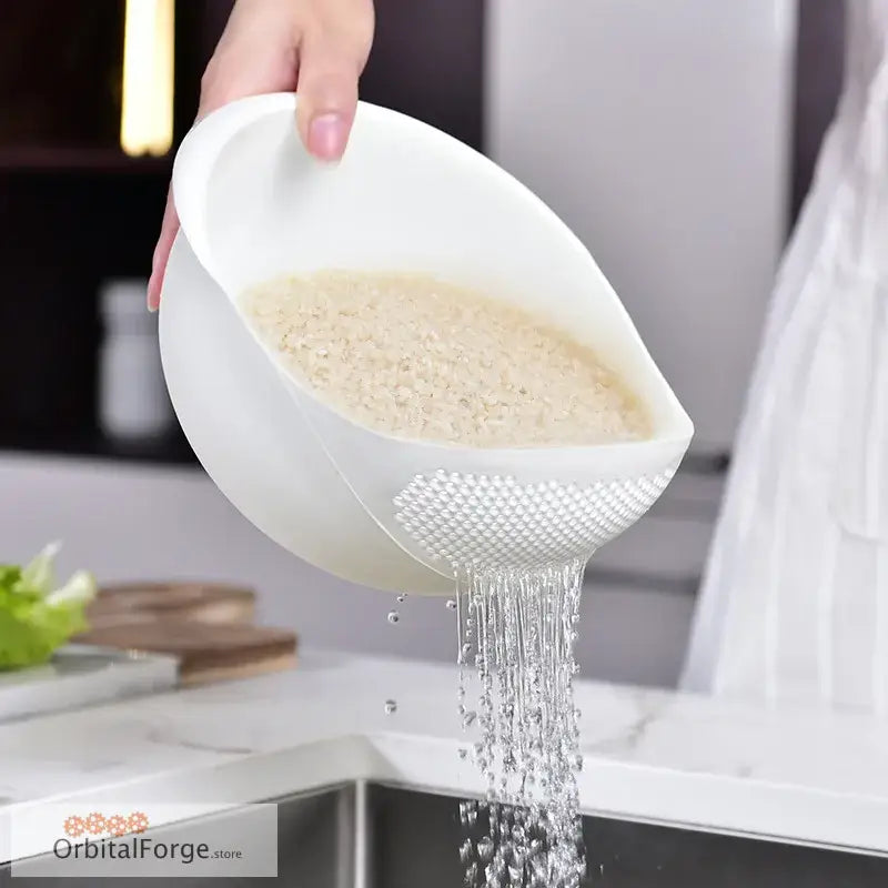 Rice washing bowl with strainer.