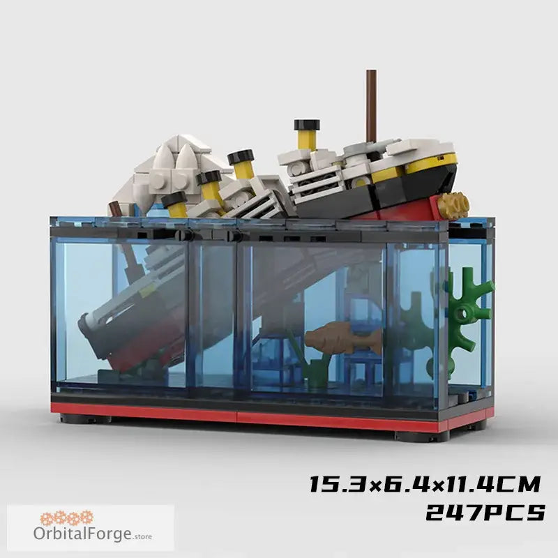 Lego Titanic shipwreck in aquarium.