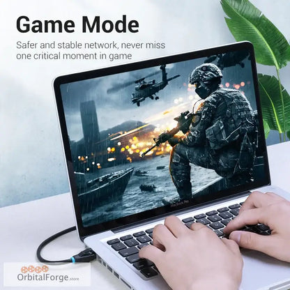 Laptop showcasing a military-themed game highlighting fast connectivity with Cat6 Ethernet Cable