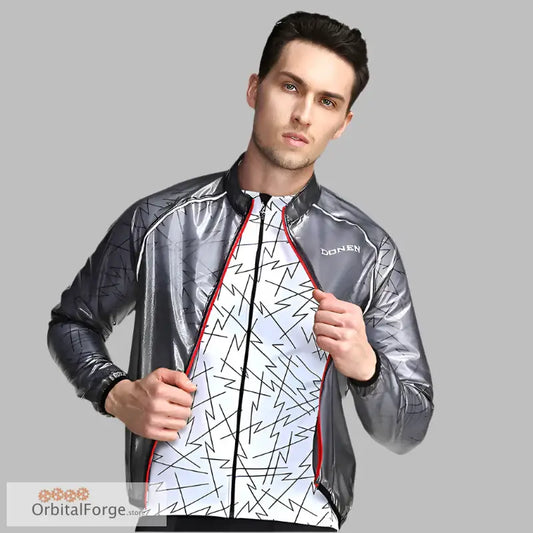 Metallic silver and white waterproof cycling jacket with geometric patterns and red accents