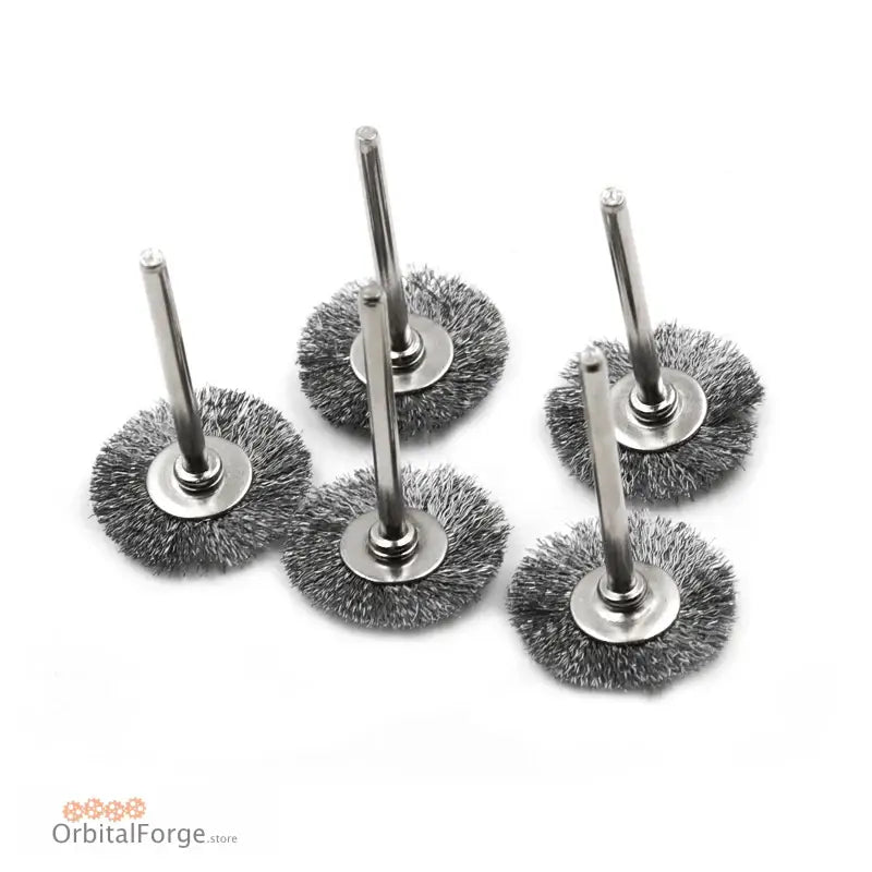 Five circular wire brush wheel attachments with metal shafts.